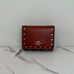 COACH Small Trifold Wallet In Colorblock Signature Canvas With Rivets